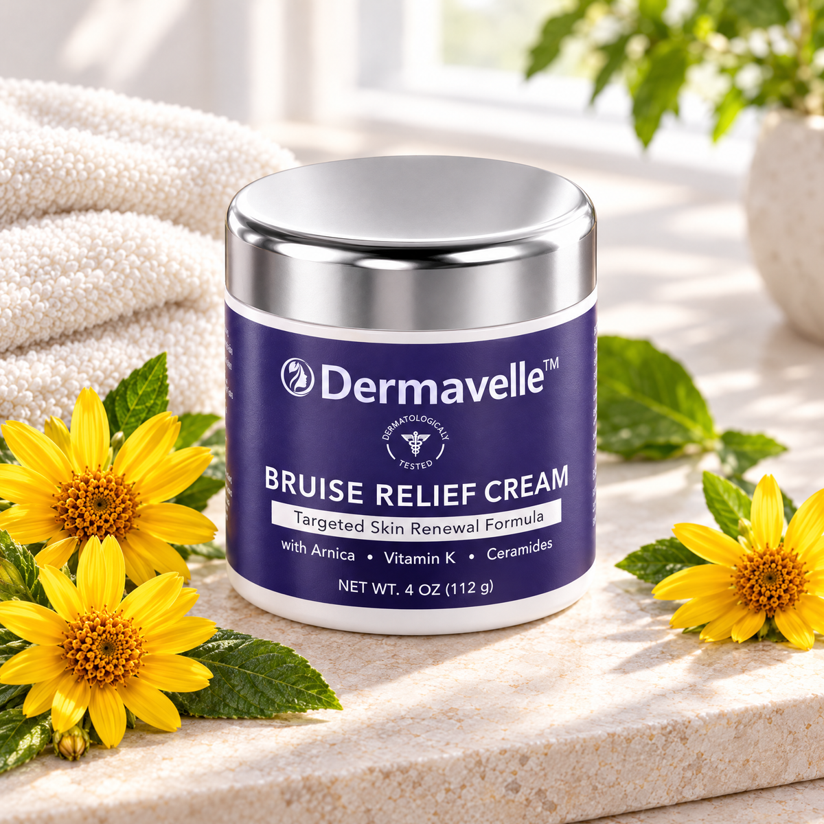 Dermavelle hudkräm med arnikablommor och handduk